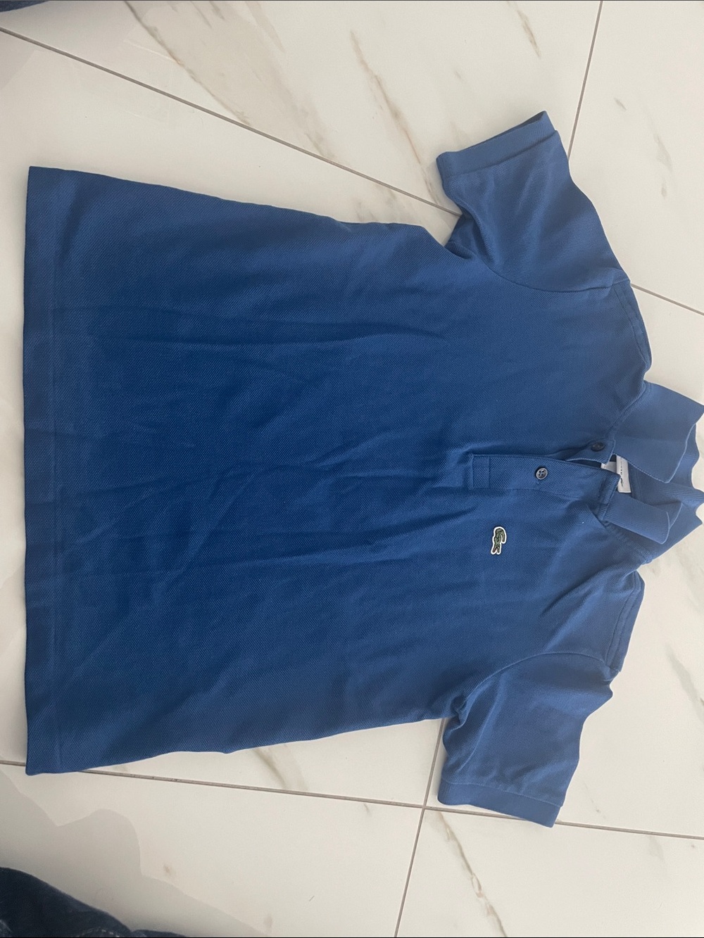 Lacoste Boys Blue Polo Shirt you will get all of them
